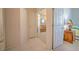 Bright hallway with tile flooring and access to other rooms at 8146 Stirling Falls Cir, Sarasota, FL 34243