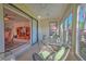 Enclosed patio with glass doors leading to living room at 8146 Stirling Falls Cir, Sarasota, FL 34243