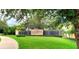 LakeRidge Falls community entrance with a water feature at 8146 Stirling Falls Cir, Sarasota, FL 34243