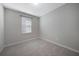 Simple bedroom with neutral walls and carpet flooring at 2275 Hamburg Ln, Punta Gorda, FL 33983