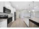 Modern kitchen with stainless steel appliances and granite countertops at 2275 Hamburg Ln, Punta Gorda, FL 33983