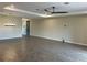 Spacious living room with tile floors and ceiling fan at 2275 Hamburg Ln, Punta Gorda, FL 33983