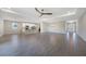 Open concept living room with tile floors, kitchen island view, and high ceilings at 2275 Hamburg Ln, Punta Gorda, FL 33983