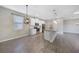 Open concept kitchen with island, stainless steel appliances, and granite countertops at 2275 Hamburg Ln, Punta Gorda, FL 33983