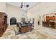 Spacious community lounge with high ceilings, comfortable seating, and a bar area for entertaining at 7612 Lake Vista Ct # 305, Lakewood Ranch, FL 34202