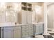 Elegant bathroom with dual vanities and marble countertops at 20910 Parkstone Ter, Bradenton, FL 34202