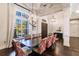 Formal dining room with a large table and elegant chandelier at 20910 Parkstone Ter, Bradenton, FL 34202