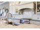 Stylish kitchen with a marble island and high-end range at 20910 Parkstone Ter, Bradenton, FL 34202