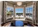 Relaxing sitting area with stunning pool and landscape views at 20910 Parkstone Ter, Bradenton, FL 34202