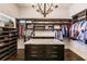 Large walk-in closet with ample shelving and hanging space at 20910 Parkstone Ter, Bradenton, FL 34202