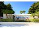 Entrance to IMG Academy in Bradenton, Florida, with lush landscaping and signage under a bright blue sky at 7909 20Th W Pl, Bradenton, FL 34209