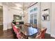 Formal dining room with large table and red chairs at 20910 Parkstone Ter, Bradenton, FL 34202