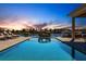 Stunning pool with lake view at sunset at 20910 Parkstone Ter, Bradenton, FL 34202