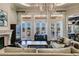 Open floor plan living room with views of the pool at 20910 Parkstone Ter, Bradenton, FL 34202