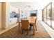 Community room with kitchen, dining area, and TV at 1400 Barcarrota Blvd W # 201, Bradenton, FL 34205