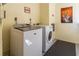 Convenient laundry room with washer and dryer at 1400 Barcarrota Blvd W # 201, Bradenton, FL 34205