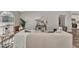 Cozy living room featuring neutral colored furniture, modern art, and bright, natural light at 4512 Ulster Ave, North Port, FL 34287