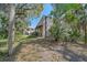 Exterior view of the house showcasing Spanish-style architecture at 4674 Hidden River Rd, Sarasota, FL 34240