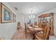 Formal dining room with wood table, chairs, and hutch at 4674 Hidden River Rd, Sarasota, FL 34240