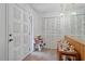 Inviting entryway with decorative door and coat closet at 4674 Hidden River Rd, Sarasota, FL 34240