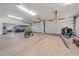 Roomy garage with storage cabinets and two large doors at 4674 Hidden River Rd, Sarasota, FL 34240