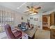 Bright home office featuring a desk, chair, and view of another room at 4674 Hidden River Rd, Sarasota, FL 34240