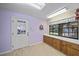 Laundry room with cabinets and access to garage at 4674 Hidden River Rd, Sarasota, FL 34240