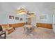 Spacious dining area featuring a table, chairs, and access to other rooms at 4674 Hidden River Rd, Sarasota, FL 34240