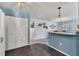 Open-concept living area with stylish flooring and seamless flow to dining space at 1647 Southwood St # 1647, Sarasota, FL 34231