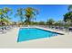 Inviting community pool with plenty of lounge chairs at 4640 Tower Hill Ln # 2322, Sarasota, FL 34238