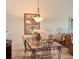 Simple dining area with glass-topped table and four chairs at 4640 Tower Hill Ln # 2322, Sarasota, FL 34238