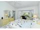 Bright bedroom with a king-size bed and window seat at 4640 Tower Hill Ln # 2322, Sarasota, FL 34238