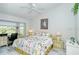 Spacious bedroom with large bed and window seat at 4640 Tower Hill Ln # 2322, Sarasota, FL 34238