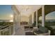 Relaxing balcony with outdoor seating at 611 Riviera Dunes Way # 702, Palmetto, FL 34221