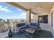 Private balcony with comfortable seating and views of the water at 35 Watergate Dr # 503, Sarasota, FL 34236