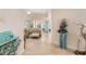 Bright and airy entryway with tile floors and views into living areas at 5814 Benevento Dr, Sarasota, FL 34238