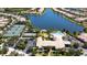 Community overview showcasing pool, tennis courts, and clubhouse at 5814 Benevento Dr, Sarasota, FL 34238