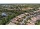 An aerial view highlighting a home's location in a tranquil neighborhood at 5814 Benevento Dr, Sarasota, FL 34238