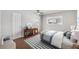 Cozy bedroom with a comfortable bed and ample natural light at 3915 Schwalbe Dr # 128, Sarasota, FL 34235