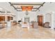 Spacious clubhouse living area with a fireplace and comfortable seating at 4166 Central Sarasota Pkwy # 533, Sarasota, FL 34238