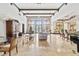 Clubhouse lounge with comfortable seating and a view of the pool at 4166 Central Sarasota Pkwy # 533, Sarasota, FL 34238