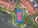 Overhead view of a well-maintained tennis court nestled within the community at 4166 Central Sarasota Pkwy # 533, Sarasota, FL 34238