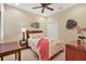 Bedroom with ceiling fan and neutral color palette at 4174 Overture Cir # 519, Bradenton, FL 34209