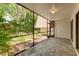 Spacious screened patio overlooking a garden at 4576 Ringwood Mdw # 5, Sarasota, FL 34235