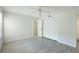 Spacious bedroom with large closet and ceiling fan at 4576 Ringwood Mdw # 5, Sarasota, FL 34235