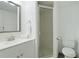 Clean bathroom with a white vanity and shower at 4576 Ringwood Mdw # 5, Sarasota, FL 34235