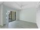 Bedroom with sliding doors that open to a patio at 4576 Ringwood Mdw # 5, Sarasota, FL 34235