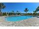Refreshing community pool with lounge chairs at 27460 Janzen Ct, Englewood, FL 34223