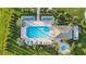 Resort-style pool and spa with plenty of lounge chairs at 27460 Janzen Ct, Englewood, FL 34223