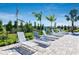Poolside lounge chairs for relaxing by the pool at 27460 Janzen Ct, Englewood, FL 34223